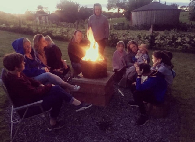 Around the firepit at Pine Tree Hollow